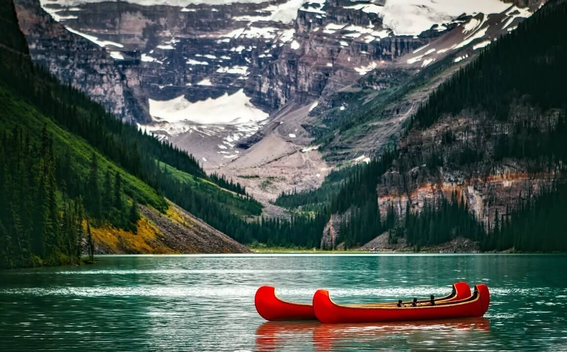 Two canoes on a lake in Canada