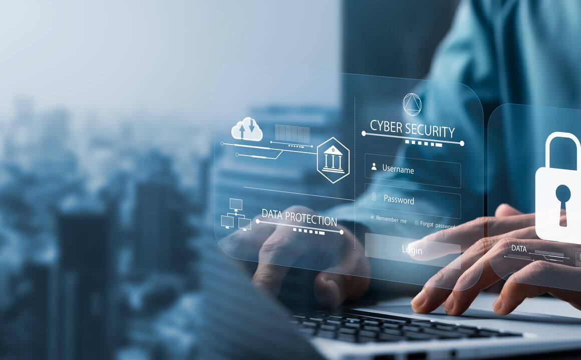 A person typing on a keyboard. Cybersecurity images appearing.